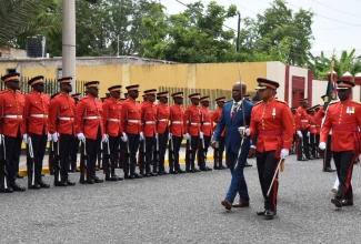 Custos Rotulorum for Kingston, Hon. Steadman Fuller (left), examines the Guard of Honour mounted by members of the Jamaica Defence Force (JDF) at Gordon House on Thursday (February 13), prior to the start of the 2025/26 Ceremonial Opening of Parliament. Mr. Fuller, who deputised for Governor General, His Excellency the Most Hon. Sir Patrick Allen, delivered the Throne Speech under the theme ‘Jamaica’s Next Chapter: Aspiring to Greatness’.

