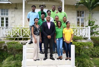 Minister of Agriculture, Fisheries and Mining, Hon. Floyd Green (second left, front row), and Principal of the College of Agriculture, Science and Education (CASE), Dr. Derrick Deslandes (second right, third row), share a photo opportunity with students, following a Think Tank at the Portland-based institution, on May 14. 