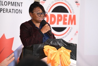 Acting Deputy Director, Office of Disaster Preparedness and Emergency Management (ODPEM), Michelle Edwards, addressing the closing ceremony for the ‘Disaster Relief Support for Women with and Affected by HIV/AIDS and Gender-based Violence in Jamaica’ project, held at 4a Hopefield Avenue in Kingston on April 30. Implemented by Eve for Life in partnership with ODPEM and Caribbean Disaster Emergency Management Agency (CDEMA), the project aimed to provide targeted, gender-sensitive relief and recovery assistance to women and families disproportionately affected by HIV/AIDS and sexual and gender-based violence. It was undertaken through funding from the  Caribbean Early Recovery Fund (CERF) and Global Affairs Canada.