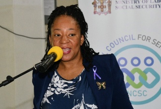 Chair of the National Council for Senior Citizens (NCSC), Dr. Julian McKoy-Davis, addresses participants at the NCSC’s Elder Abuse Awareness Seminar on Friday (June 13) at Stella Maris Catholic Church in St. Andrew. The event was in observance of World Elder Abuse Awareness Day, commemorated annually on June 15.
