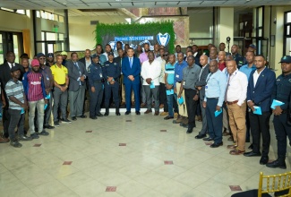 Prime Minister, Dr. the Most Hon. Andrew Holness (centre, front row), shares a photo opportunity with members of staff during a special Father’s Day function on Wednesday (June 11), The function was held at the Office of the Prime Minister. Fathers who are staff members of the Office of the Prime Minister, Jamaica House and the Office of the Cabinet were honoured during the event. Father’s Day 2025 will be observed on Sunday, June 15.

