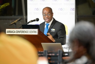 Chief Executive Officer (CEO) of the National Environment and Planning Agency (NEPA), Leonard Francis, addresses a recent symposium on the environment, held at the Jamaica Conference Centre in downtown Kingston.


