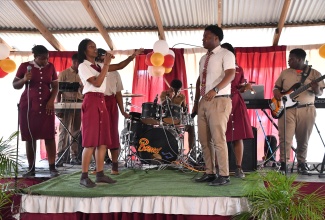 The Herbert Morrison Technical High School band performs during the handover ceremony for high-end studio equipment donated by International disc jockey, Tayari McIntosh, more widely recognised as “DJ Trauma”, on June 5. 
