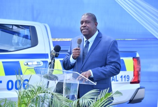 Head of the Public Safety and Traffic Enforcement Branch (PSTEB), Assistant Commissioner of Police (ACP) Dr. Gary McKenzie, speaks at a handover ceremony for a new vehicle donated to the Pedro Plains Police Station, in St. Elizabeth, by the Tourism Product Development Company (TPDCo), on Wednesday (July 16). 

