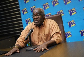 Director General of Road Traffic at the Island Traffic Authority (ITA), Colonel (ret’d) Daniel Pryce, speaks at a Jamaica Information Service (JIS) Think Tank, on July 18. Colonel Pryce explained the implementation of the electronic Motor Vehicle Certificate of Fitness on  July 21.

