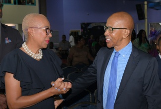Minister of Finance and the Public Service, Hon. Fayval Williams, greets Public Procurement Commission (PPC) Chairman, Milverton Reynolds, during the agency’s fifth anniversary thanksgiving service held at Celebration Church in Portmore, St. Catherine, on Sunday (July 20).

 