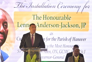 Prime Minister, Dr. the Most Hon. Andrew Holness (left), congratulates the newly installed Custos Rotulorum of Hanover, the Hon. Lennox Anderson-Jackson, during the official installation ceremony held at Rusea's High School in Lucea on Thursday (July 17).

