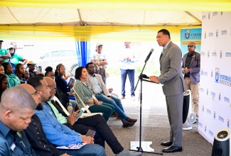 Prime Minister, Dr. the Most Hon. Andrew Holness, addresses Thursday’s (July 31) launch of the Cockburn Gardens community Wi-Fi at Dupont Primary and Infant School in St. Andrew.