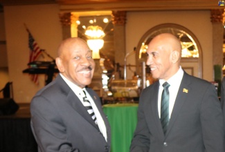 Jamaica’s Ambassador to the United States, His Excellency Major General (Ret’d) Antony Anderson (right), is greeted by President of the Jamaica Association of Maryland, Rick Nugent, at the association’s Annual Independence Gala and Awards Ceremony, held on Saturday, August 9, in Baltimore.