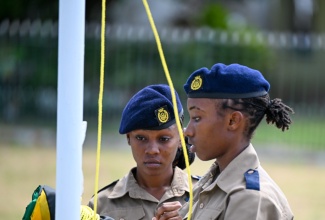 Cadets unfurl the Jamaican flag during the Independence Day Flag Raising Ceremony and Parade of Uniform Groups ceremony on August 6, at the Paul Bogle Square in Morant Bay, St. Thomas.