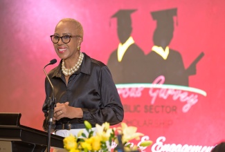 Minister of Finance and the Public Service, Hon. Fayval Williams, addresses the Marcus Garvey Public Sector Graduate Scholarship Awards Ceremony and Engagement Session, held at The Jamaica Pegasus hotel in New Kingston, on Wednesday (August 13). Thirty public-sector workers were awarded full scholarships at the ceremony.