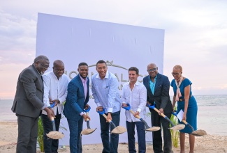 Prime Minister, Dr. the Most Hon. Andrew Holness (centre), breaks ground for the US$700-million Moon Palace The Grand Montego Bay, in Success, St. James, on Monday, August 11. He is joined by (from left) Custos of St. James, Bishop Conrad Pitkin; Vice President, Moon Palace Jamaica All-Inclusive Resort, Clifton Reader; Chairman of the St. James Municipal Corporation and Mayor of Montego Bay, Councillor Richard Vernon; Chief Executive Officer of Palace Resorts, Gibran Chapur; Minister of Tourism, Hon. Edmund Bartlett; and Minister of Finance and the Public Service, Hon. Fayval Williams.

