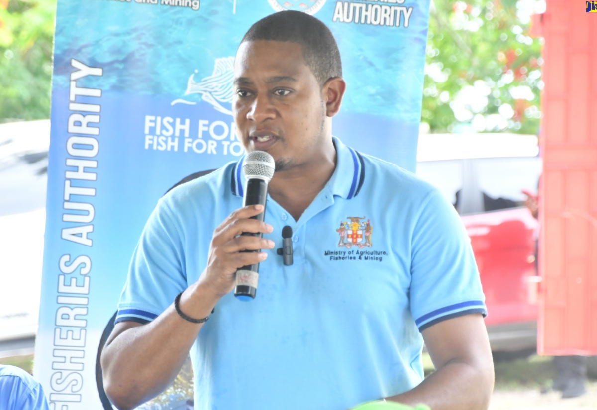 Minister of Agriculture, Fisheries and Mining, Hon. Floyd Green, addresses the handover ceremony for  boats and engines to fishers from St. Elizabeth and Westmoreland, at  the  National Fisheries Authority's (NFA) Black River office, in St. Elizabeth,  on Wednesday (August 13). 